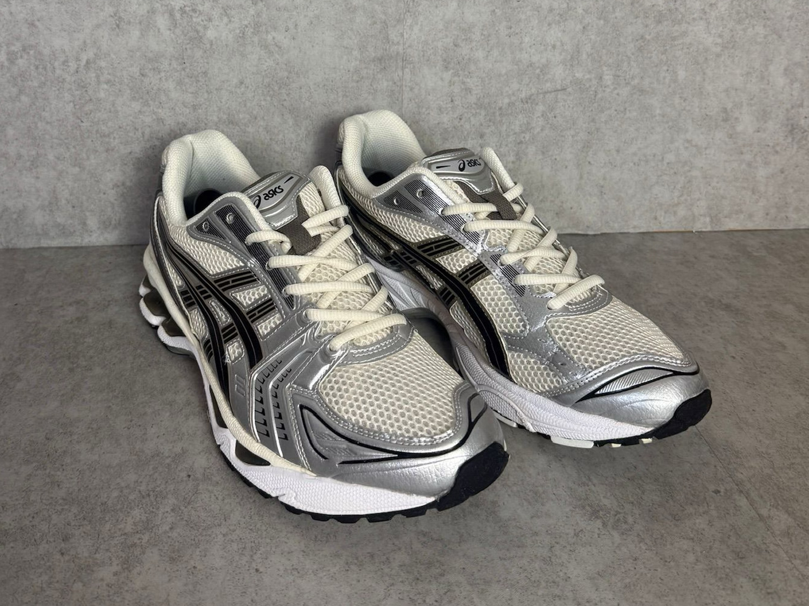 Asics Gel-Kayano in cream and silver after restoration